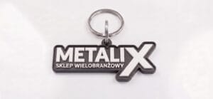 Personalizowany brelok reklamowy z logo firmy Brelok reklamowy z logo firmy wykonany w technologii druku 3D
